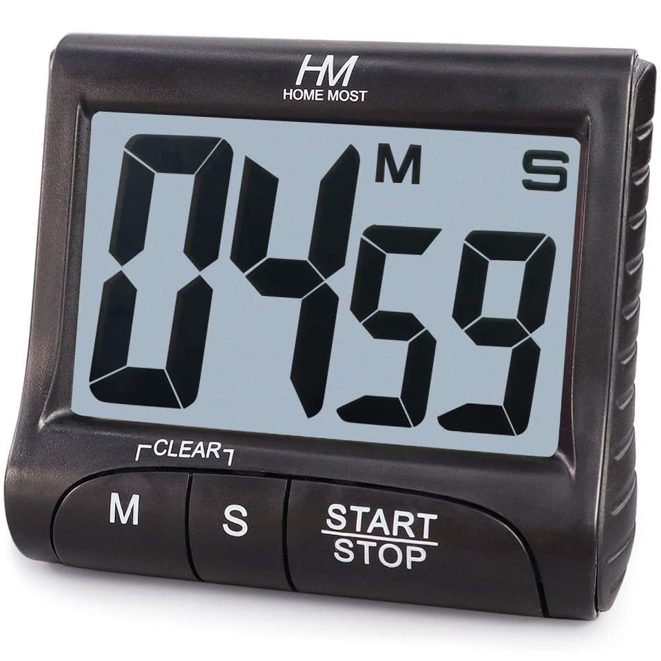 HOME MOST timer with magnetic back on fridge for quick access.