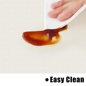 Homing easy-clean tablecloth wipes clean with a damp cloth.