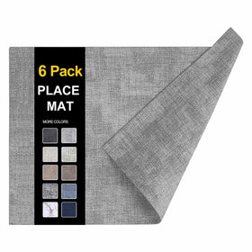 Homing faux leather placemats laid out on dining table preventing spills