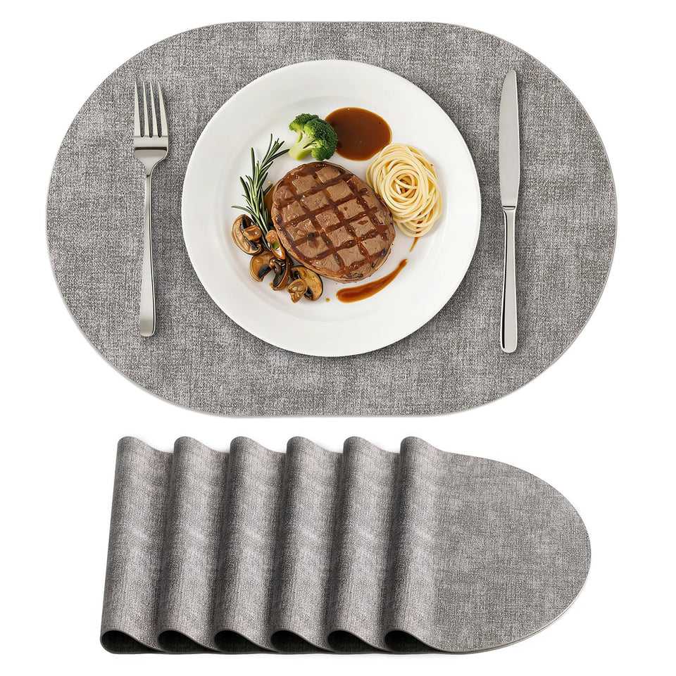 Homing oval placemats set shows heat resistance and table protection.