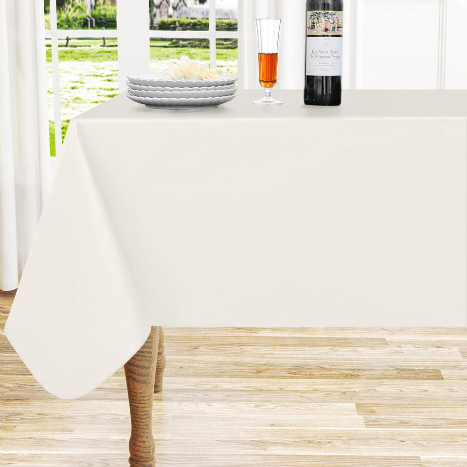 Homing rectangle vinyl tablecloth in beige 60x84 protects the dining surface from spills.