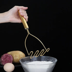HOMQUEN Gold Potato Masher dishwasher-safe label for easy cleaning.