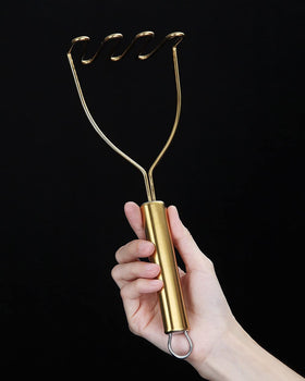 HOMQUEN Gold Potato Masher ergonomic handles support comfortable grip.