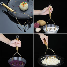 HOMQUEN Gold Potato Masher stored neatly in a kitchen drawer.