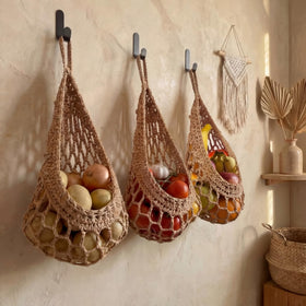 Honeydak bohemian wall decor adds rustic appeal while organizing shelves