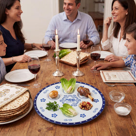 Honeydak Seder Plate on a festive Passover table as centerpiece.