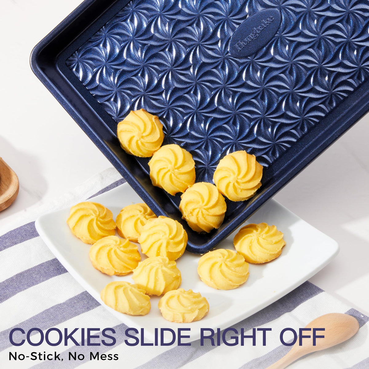 HONGBAKE jelly roll pan shows floral swirl texture for uniform heat circulation.