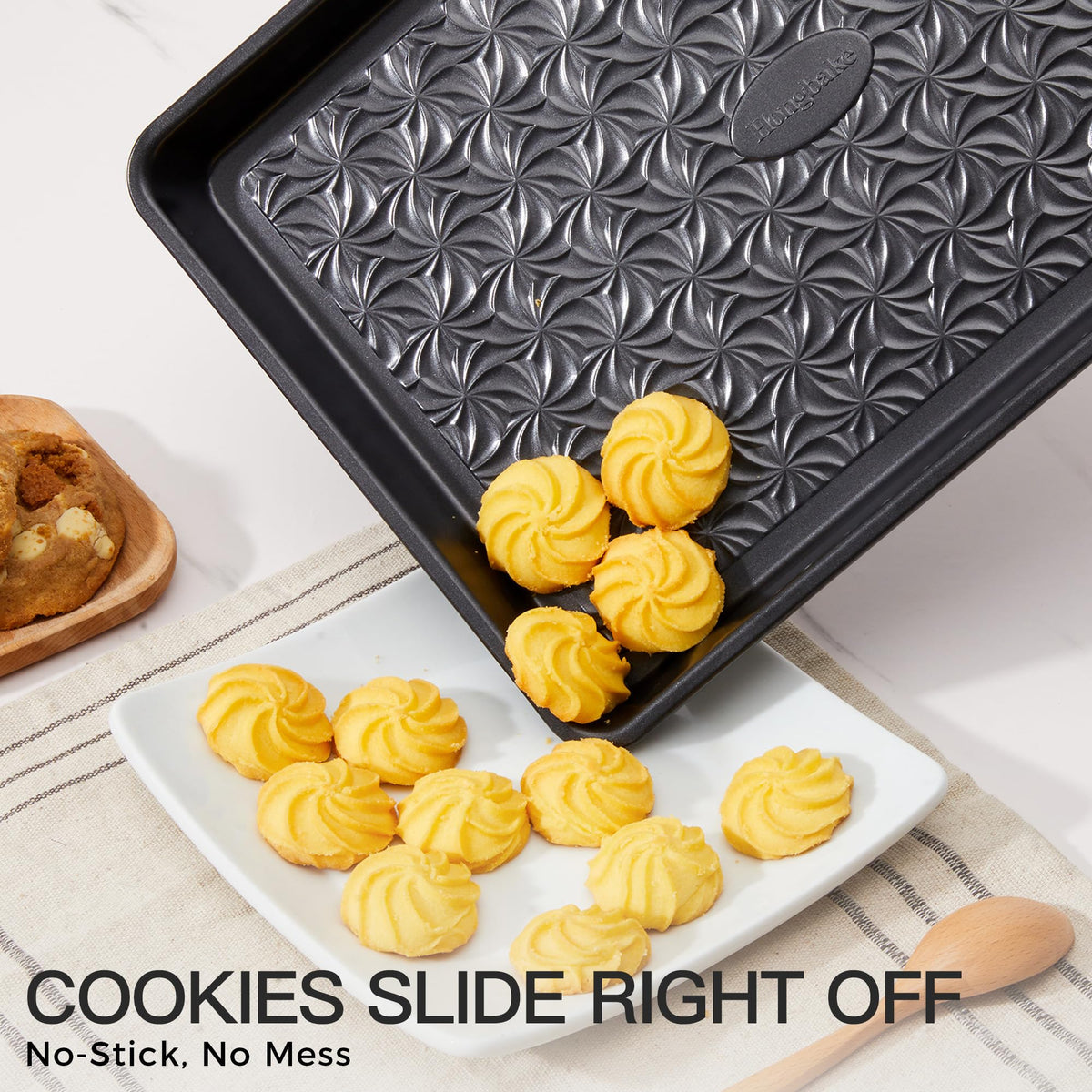 HONGBAKE jelly roll pan with floral swirl texture for even heat distribution.