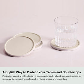 Hoomey absorbent ceramic coasters soaking up spills near a coffee cup without mess.