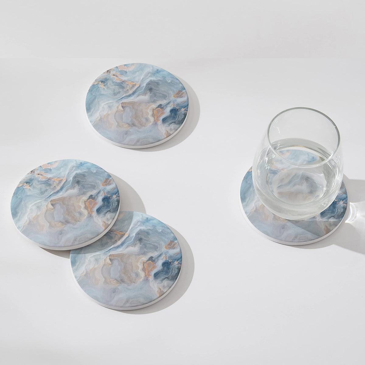 Hoomey absorbent ceramic coasters quickly wick moisture, keeping surfaces clean.