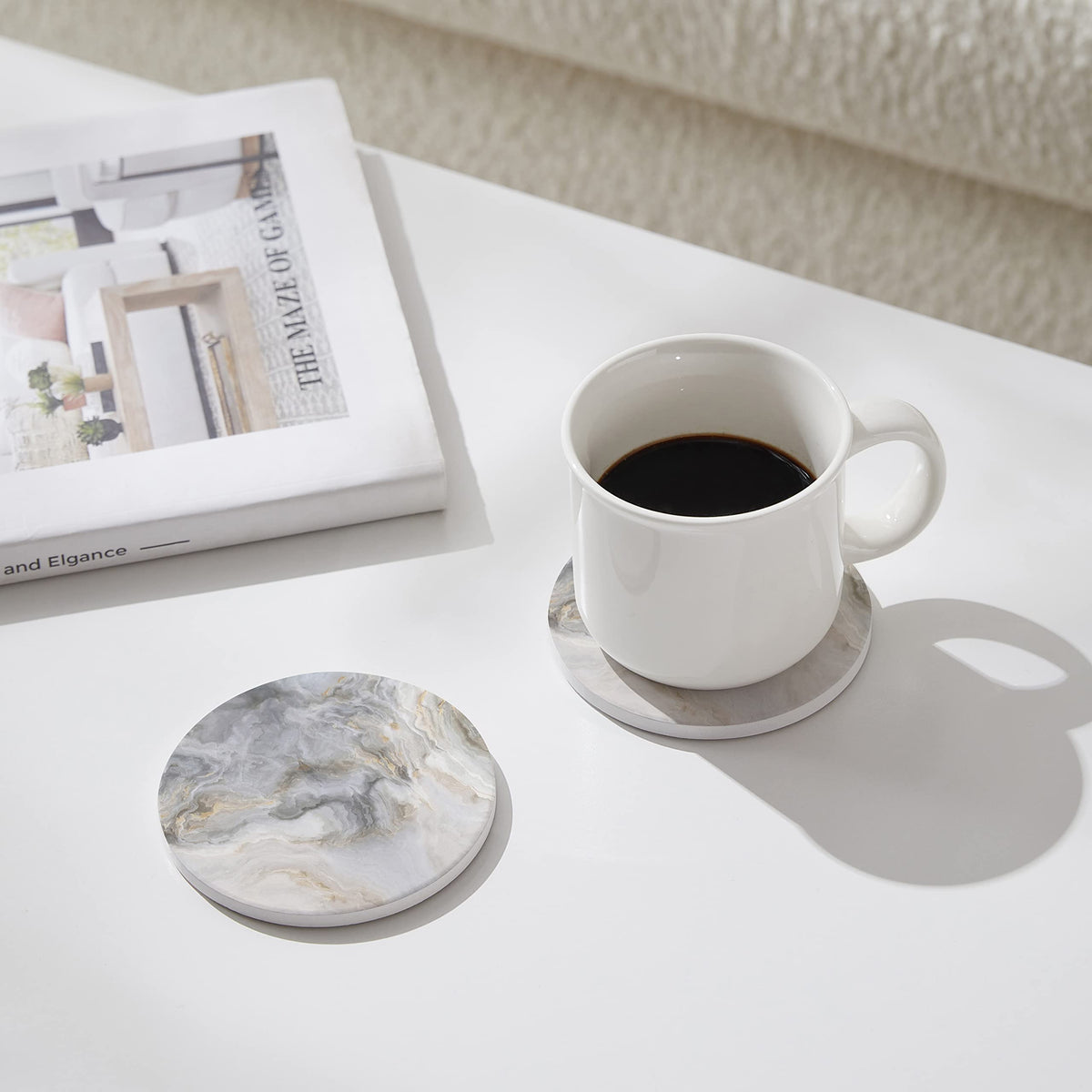 Hoomey ceramic absorbent coasters quickly wick moisture and guard tabletops.