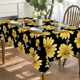 Horaldaily dining setup with this tablecloth enhances family meals with sunny decor.