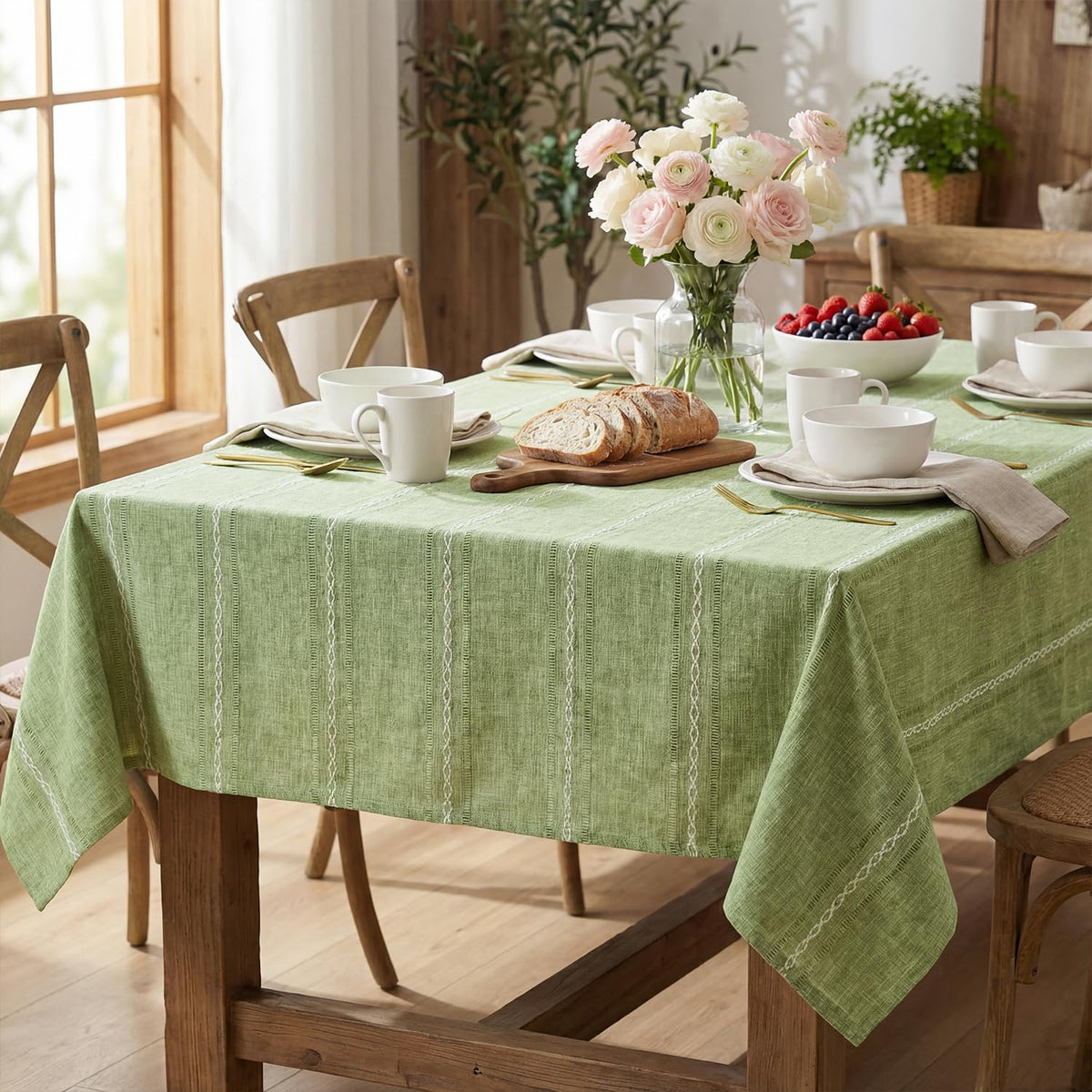 Horaldaily Sage Green Tablecloth 60x84 in on a rectangular table, showcasing rustic elegance and surface protection