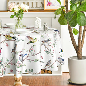 Horaldaily tablecloth close-up showing stitching and birds-branch-white-floral motif.