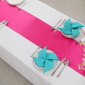 Horbaunal party setup featuring satin runners elevates table presentation
