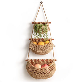 horpait 3-tier hanging fruit basket on a door for kitchen organization.