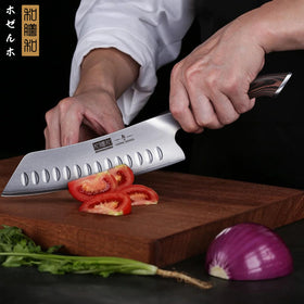 HOSHANHO slicing action demonstrates thin, even cuts on vegetables