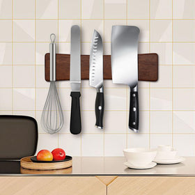 HOSHANHO multipurpose magnetic rack holds knives, scissors, and small tools.