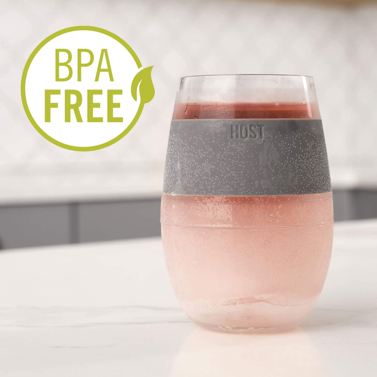 Silicone grip on Host Wine FREEZE tumbler for comfortable handling outdoors.
