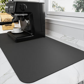 HotLive coffee mat with absorbent surface soaking up spills quickly.