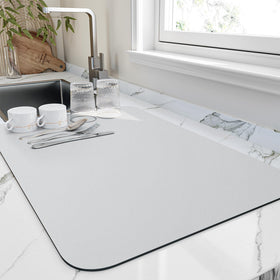 HotLive dish drying mat with absorbent nanomaterials for fast drying and reduced spills.
