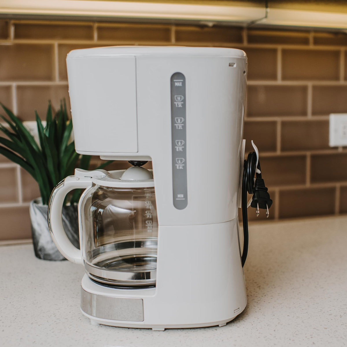 Cordsy Wrap in a kitchen setting showing organized cords.