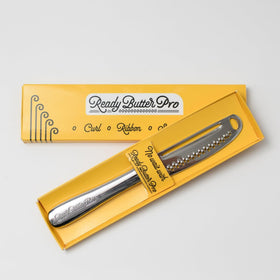 Houseify READY BUTTER PRO knife with micro-graters for effortless cold-butter spreading.
