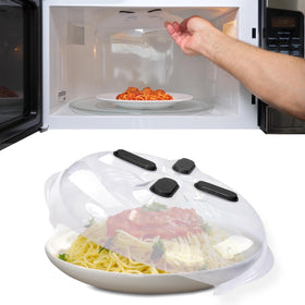 Hover Cover 12-inch splatter guard protecting food and counters during reheating.