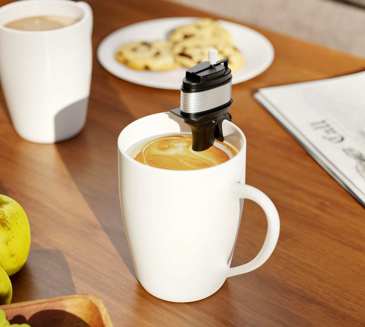 Hoyt Mercantile Co The Motor Mixer in coffee cup demonstrates playful, compact design for on-the-go moments.