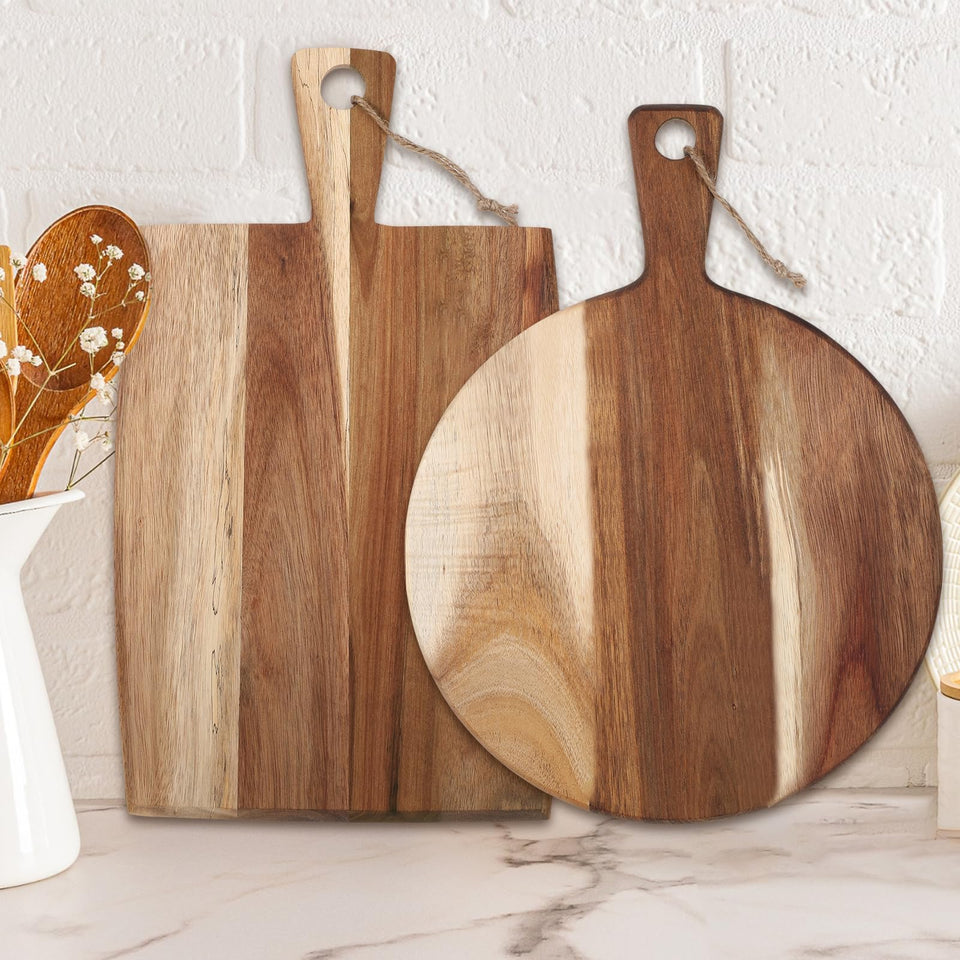 Hsei round acacia cutting board with handle for easy serving.