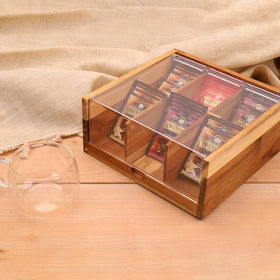 HTB acacia tea chest with clear lid shows contents at a glance.