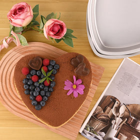 HUAKENER heart pan side view showing integrated mold design for leak resistance