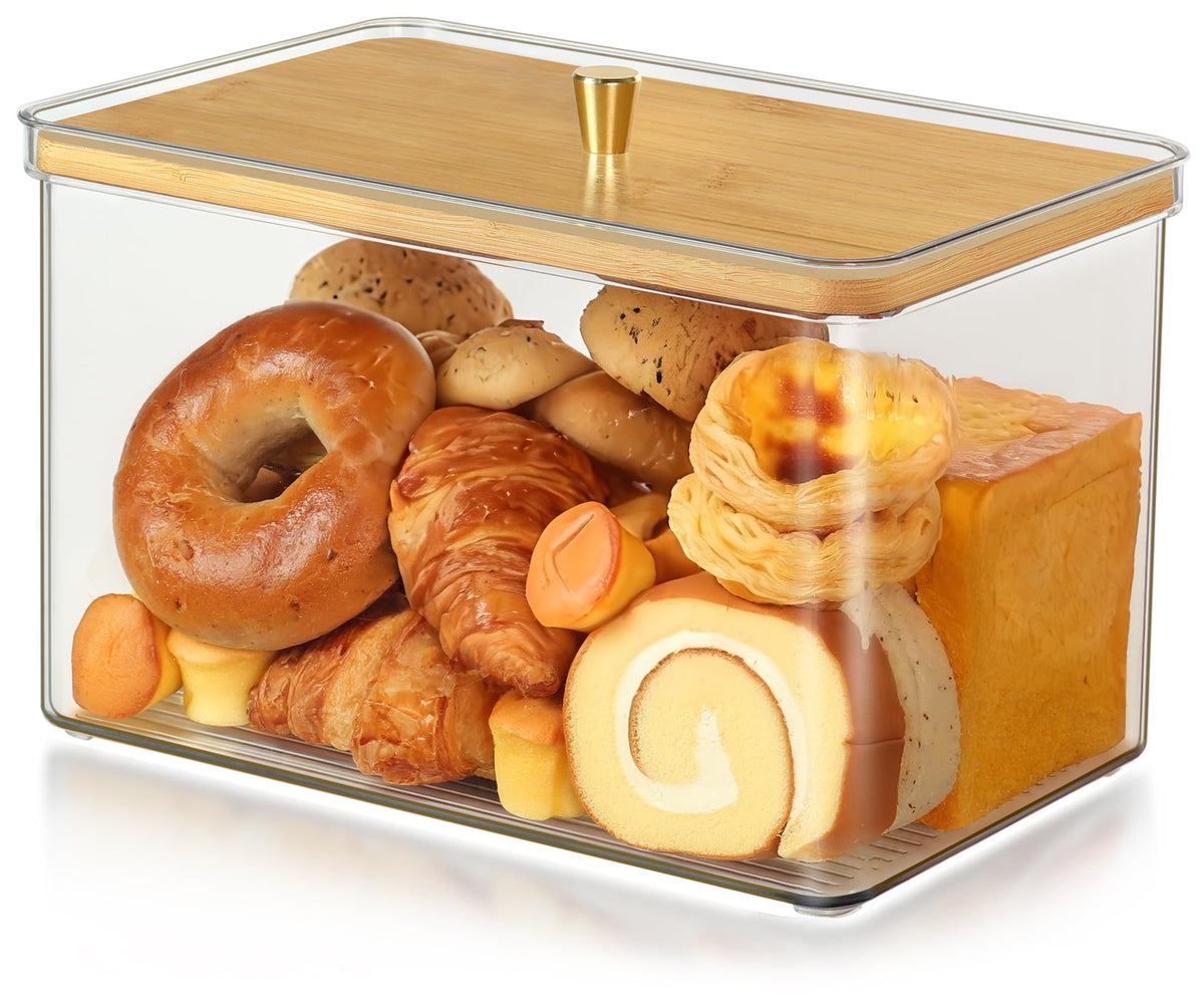Hudgan breadbox with transparent acrylic body on the counter showing fresh bread