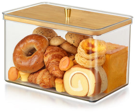 Hudgan breadbox with transparent acrylic body on the counter showing fresh bread