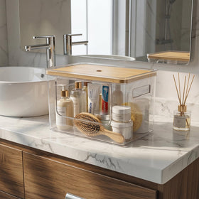 Hudgan stackable clear containers provide visible storage for supplies.