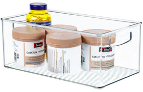 Hudgan stackable pantry bin demonstrates vertical organization and space saving.