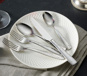 Hudson Essentials hammered flatware ergonomic hold; comfortable to use.