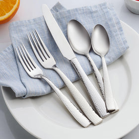 Hudson Essentials hammered flatware service for 8; perfect for gatherings.
