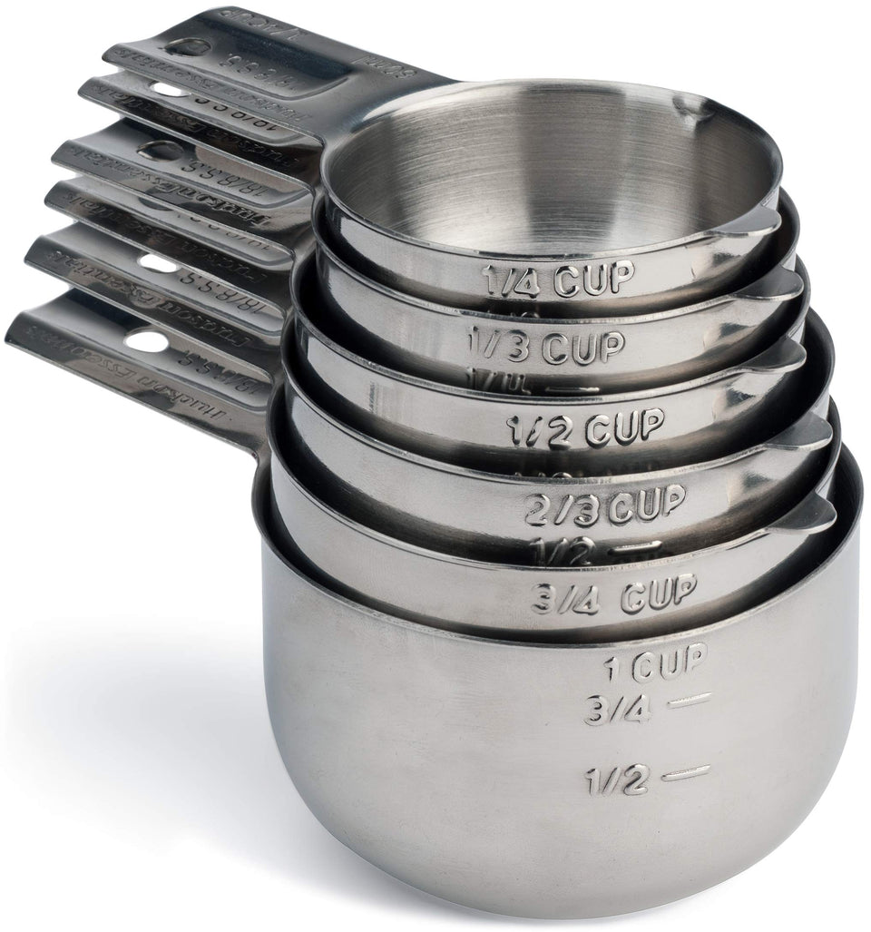 Hudson Essentials measuring cups 1/4 cup focus for precise dry measurements.