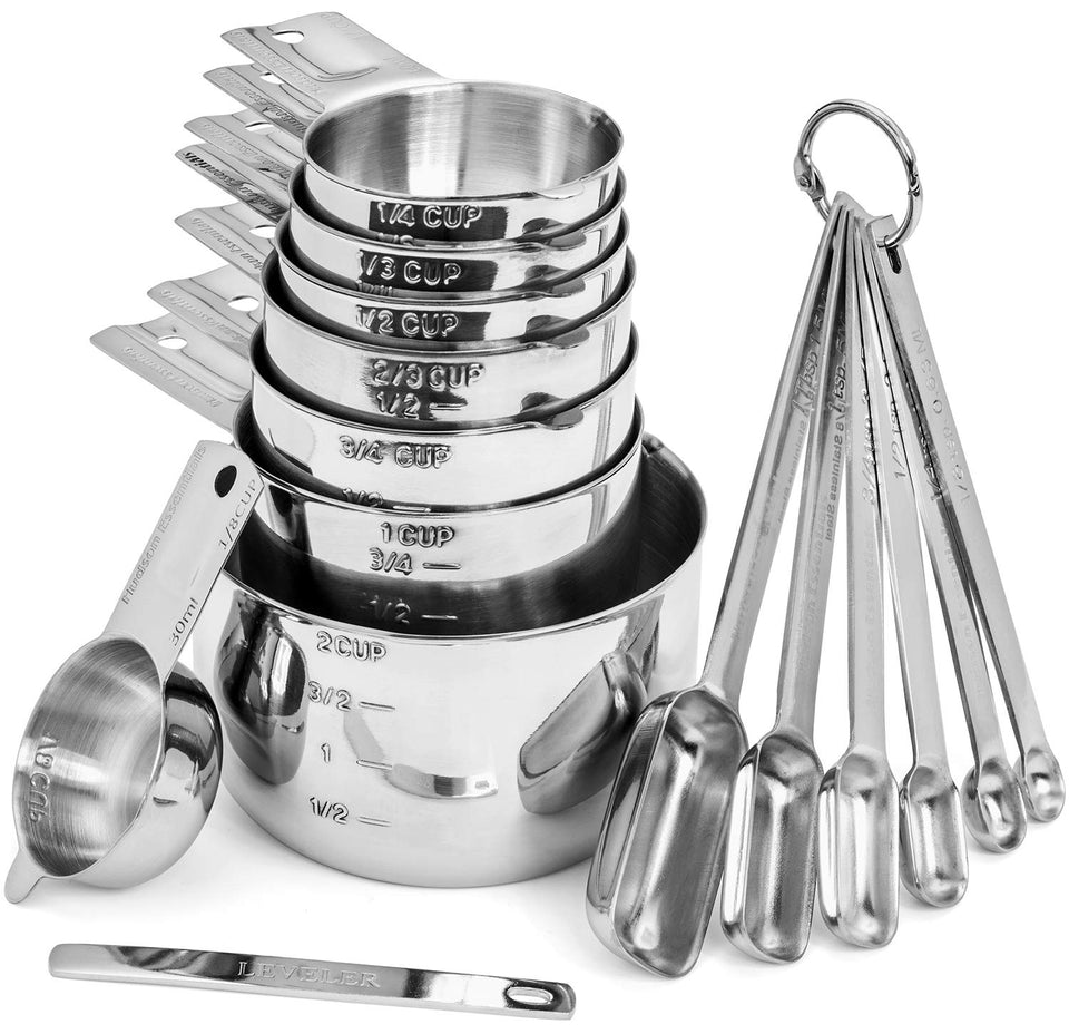 Hudson Essentials stainless steel measuring cups nest for easy storage and durability.