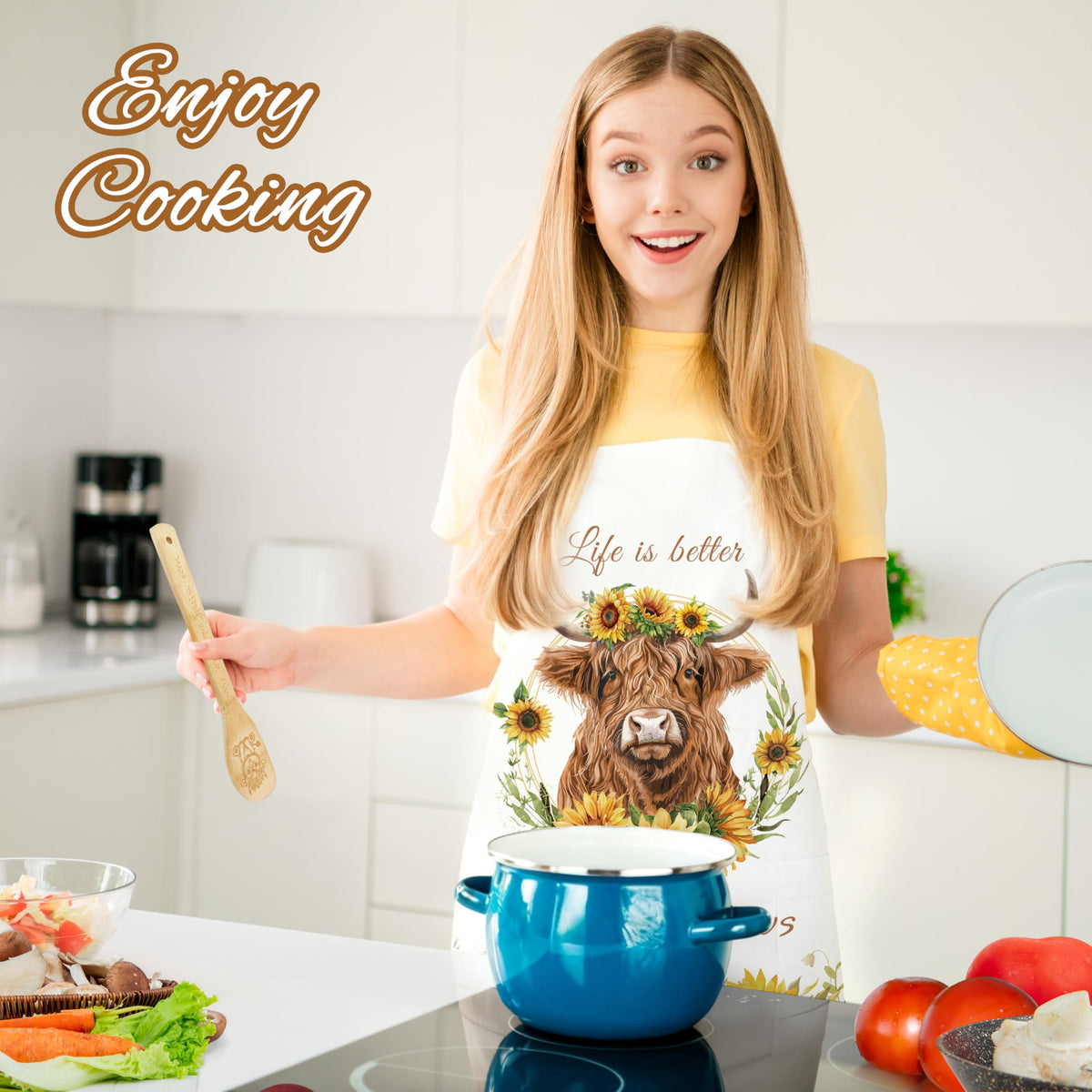 HUFAND Highland Cow apron detail with sunflower motif.