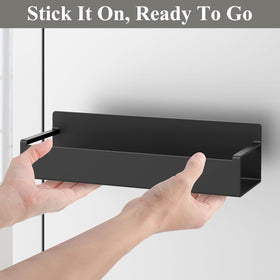 HuggieGems black spice rack on oven surface.