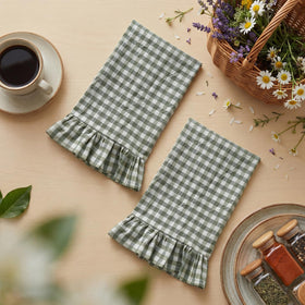 HunnmingRe sage green towels show absorbent cotton weave and hanging loop for easy drying.