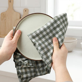 HunnmingRe sage-green plaid detail adds decorative touch to kitchen decor.