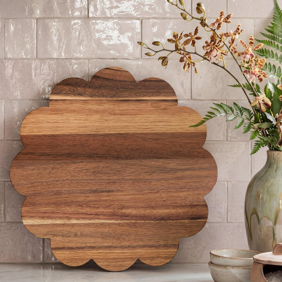 Hushee acacia scalloped cutting board round for stylish serving and prep.