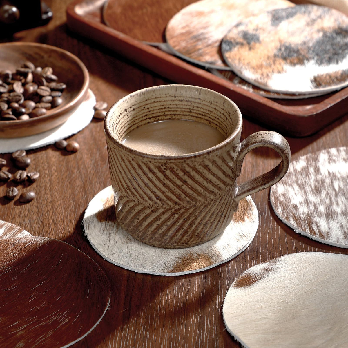 Hushee cowhide coaster with unique pattern, ideal for stylish gifting.