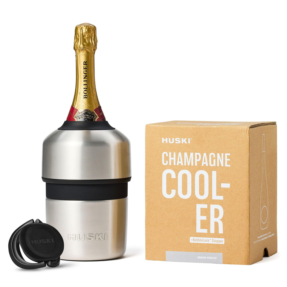 Huski Champagne Chiller with bottle clip secures the bottle for easy pouring