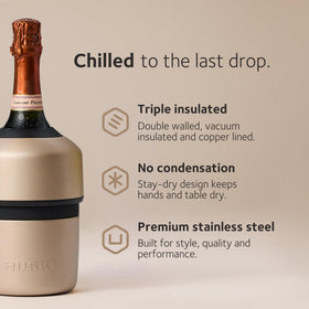 Huski Champagne Chiller in-use at picnic demonstrates outdoor chilling convenience.