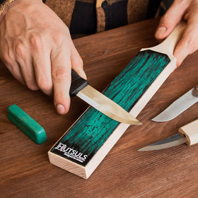 Hutsuls green stropping compound included to accelerate blade refinement.