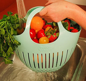 Hutzler Mini Colander gathers tomatoes and flowers, keeping delicate harvests intact